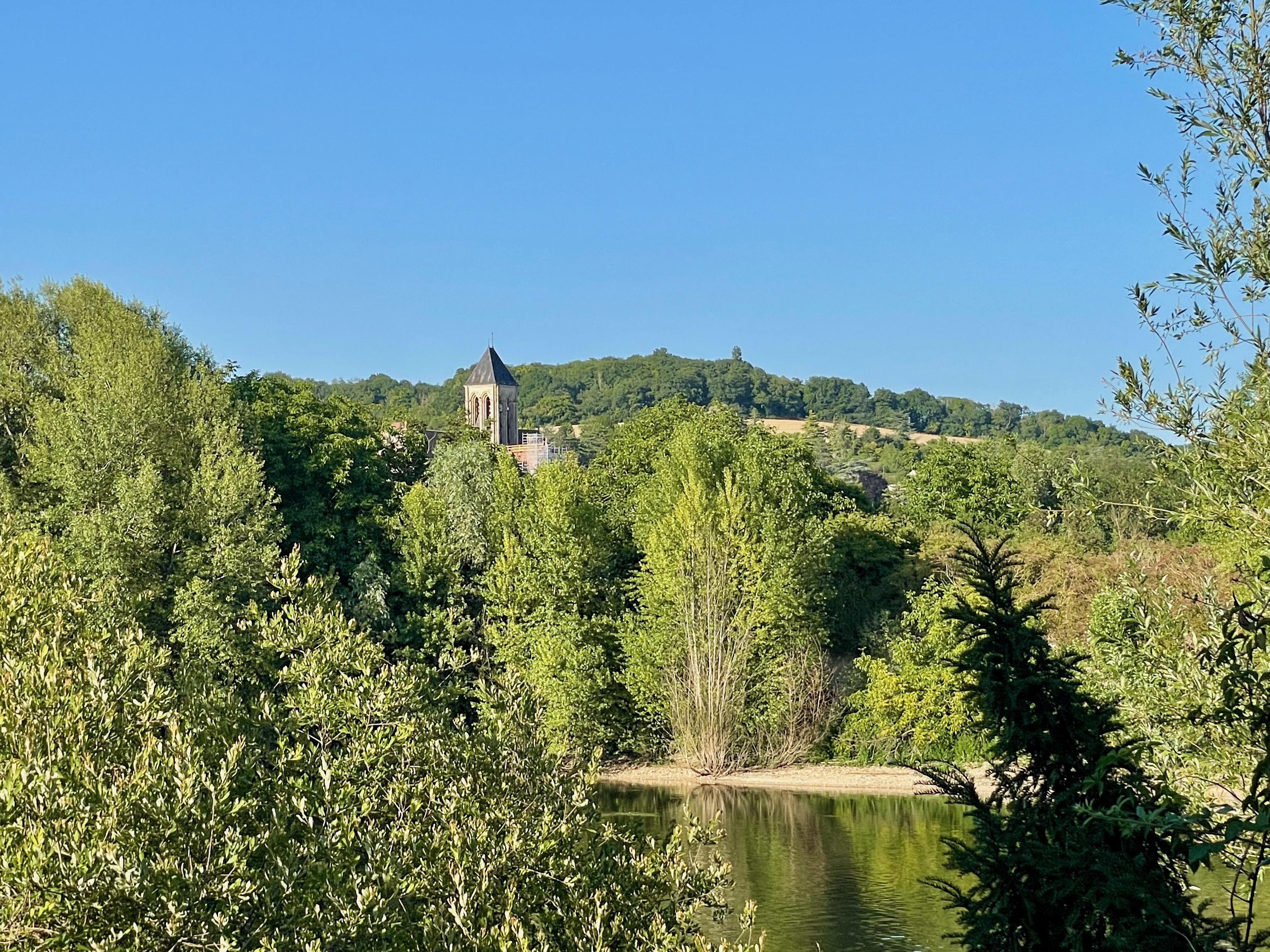 Countryside scene with lush green trees and landscape